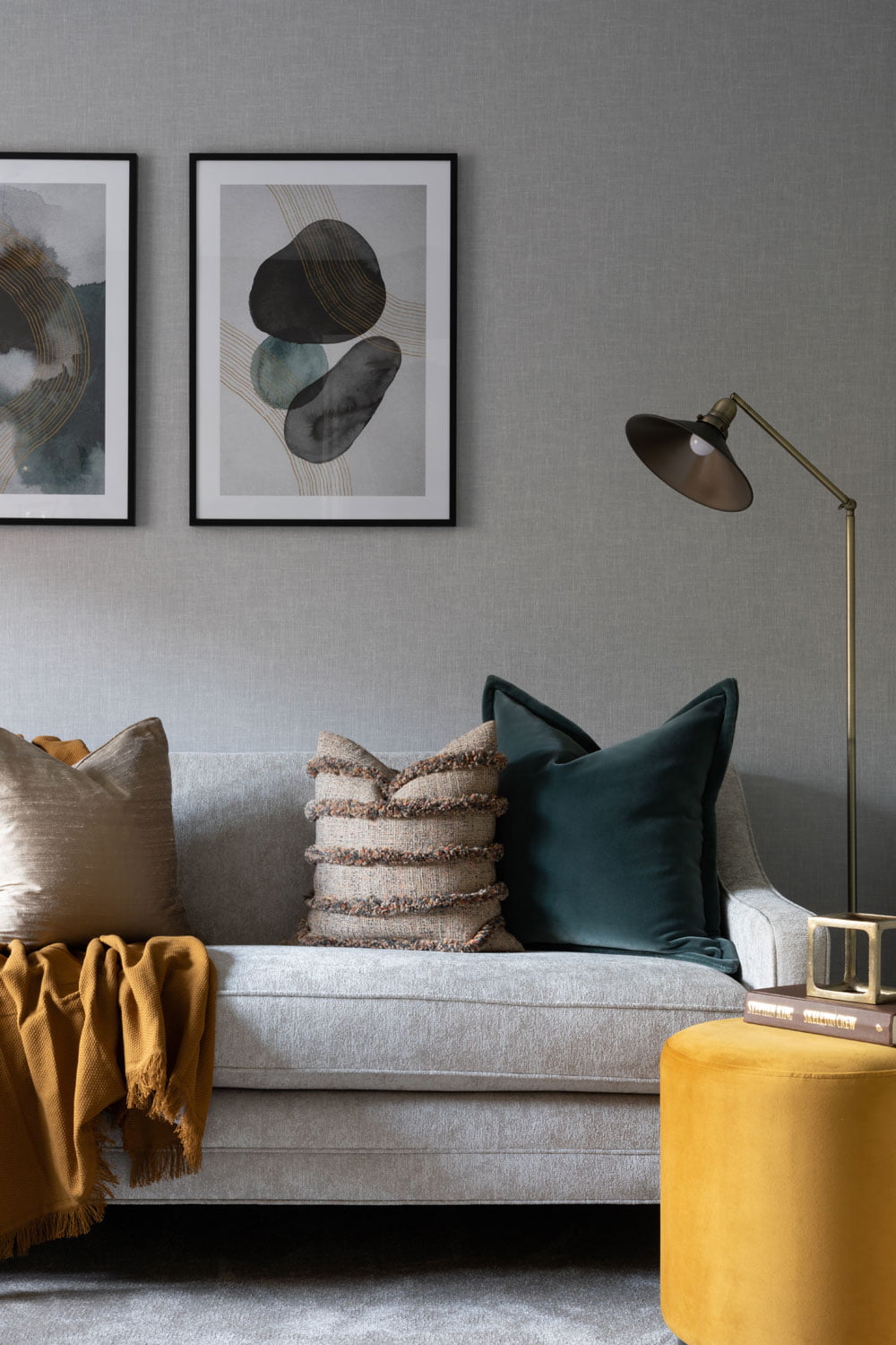 grey and yellow living room with standing lamp